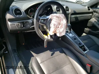 2017 Porsche 718 Boxster z VIN WP0CA2A85HS221846, wystawiony jako Copart lot #55542923 z przebiegiem 32 293 mil mil oraz . Historia ofert i sprzedaży dostępna na DreamBid. Obrazek 8.