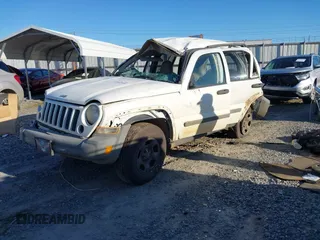 2005 Jeep Liberty Sport with VIN 1J4GK48KX5W679070, listed as a IAAI auction lot 41807899 with 157,726 mi miles. Bid and sale history available at carsss.com. Image 17.