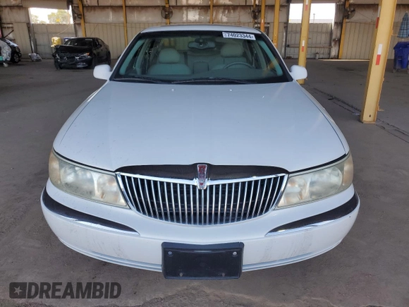 2001 Lincoln Continental with VIN 1LNHM97V31Y622782, listed as a Copart auction lot 74023344 with 116,672 mi miles and Salvage Title. Bid and sale history available at carsss.com. Image 5.