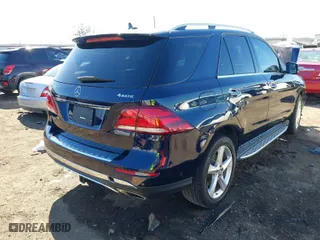 2016 Mercedes-Benz GLE with VIN 4JGDA5HB0GA719802, listed as a IAAI auction lot 41595294 with 112,527 mi miles. Bid and sale history available at carsss.com. Image 4.