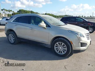 2017 Cadillac XT5 FWD with VIN 1GYKNARS0HZ174625, listed as a IAAI auction lot 41520634 with 116,169 mi miles. Bid and sale history available at carsss.com. Image 1.
