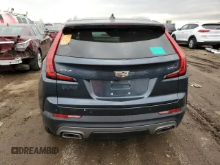 2020 Cadillac XT4 FWD Premium Luxury z VIN 1GYFZCR43LF050118, wystawiony jako Copart lot #49529635 z przebiegiem 93 290 mil mil oraz Tytuł czysty. Historia ofert i sprzedaży dostępna na DreamBid. Obrazek 6.