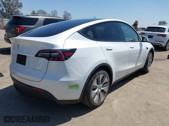 2023 Tesla Model Y Long Range z VIN 7SAYGDEE5PA104635, wystawiony jako IAAI lot #41989014 z przebiegiem 15 347 mil mil oraz . Historia ofert i sprzedaży dostępna na DreamBid. Obrazek 4.