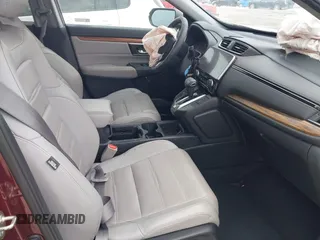2018 Honda CR-V EX-L z VIN 2HKRW2H87JH698848, wystawiony jako IAAI lot #41624159 z przebiegiem 62 198 mil mil oraz . Historia ofert i sprzedaży dostępna na DreamBid. Obrazek 5.