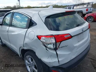 2021 Honda HR-V LX with VIN 3CZRU5H37MM718648, listed as a IAAI auction lot 42005588 with 67,225 mi miles and . Bid and sale history available at DreamBid. Image 6.