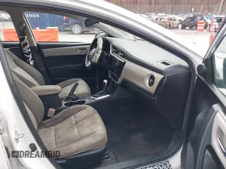 2018 Toyota Corolla L z VIN 5YFBURHE7JP840916, wystawiony jako IAAI lot #41603264 z przebiegiem 218 028 mil mil oraz . Historia ofert i sprzedaży dostępna na DreamBid. Obrazek 5.