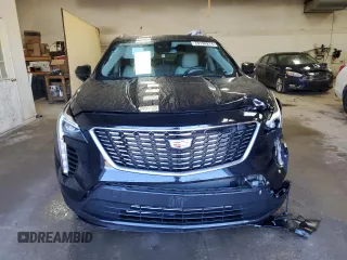 2022 Cadillac XT4 AWD Luxury with VIN 1GYFZBR45NF145986, listed as a Copart auction lot 79198274 with 23,477 mi miles and Salvage Title. Bid and sale history available at carsss.com. Image 5.