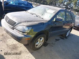 2000 Lexus RX 300 with VIN JT6GF10U6Y0047977, listed as a IAAI auction lot 41454132 with 117,947 mi miles. Bid and sale history available at carsss.com. Image 2.