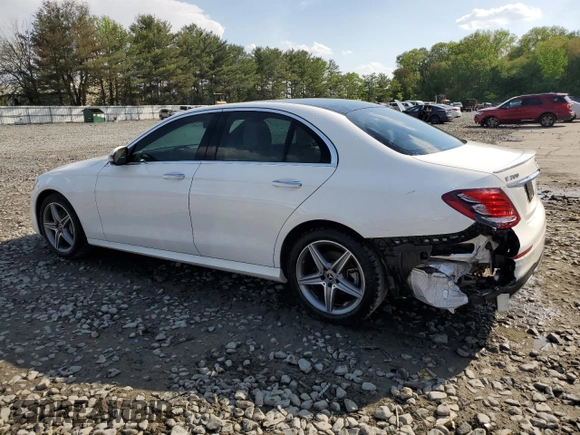 2019 Mercedes-Benz E 300 with VIN WDDZF4KB9KA520910, listed as a Copart auction lot 54697765 with 69,324 mi miles and Salvage title. Bid and sale history available at DreamBid. Image 2.