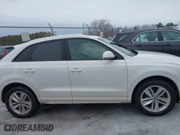 2017 Audi Q3 Premium z VIN WA1BCCFS4HR016424, wystawiony jako IAAI lot #41627278 z przebiegiem 60 028 mil mil oraz . Historia ofert i sprzedaży dostępna na DreamBid. Obrazek 13.