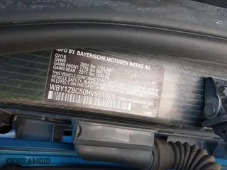 2017 BMW i3 with VIN WBY1Z8C50HV551025, listed as a IAAI auction lot 41722975 with 85,709 mi miles. Bid and sale history available at carsss.com. Image 9.