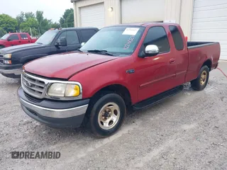 2000 Ford F-150 XL z VIN 1FTZX1722YNB37228, wystawiony jako IAAI lot #42241027 z przebiegiem Nie podano mil oraz . Historia ofert i sprzedaży dostępna na DreamBid. Obrazek 2.