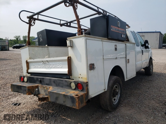 2013 Ford F-250 XL with VIN 1FD7X2B66DEA24301, listed as a Copart auction lot 48627771 with 244,779 mi miles and Salvage title. Bid and sale history available at DreamBid. Image 4.
