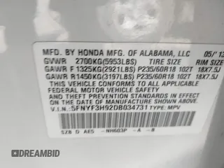 2013 Honda Pilot Touring with VIN 5FNYF3H92DB034731, listed as a IAAI auction lot 42049853 with 127,278 mi miles and . Bid and sale history available at DreamBid. Image 9.