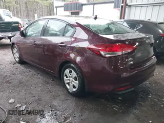 2018 Kia Forte LX with VIN 3KPFK4A79JE258999, listed as a IAAI auction lot 41769396 with 86,597 mi miles. Bid and sale history available at carsss.com. Image 3.