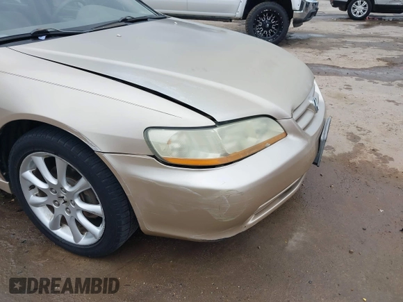2001 Honda Accord EX z VIN 1HGCG165X1A077702, wystawiony jako IAAI lot #41770556 z przebiegiem 149 516 mil mil oraz . Historia ofert i sprzedaży dostępna na DreamBid. Obrazek 17.