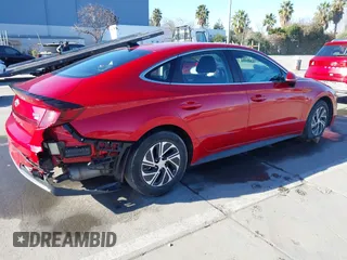 2020 Hyundai Sonata Hybrid Blue with VIN KMHL24JJ1LA009550, listed as a IAAI auction lot 41265226 with 85,347 mi miles. Bid and sale history available at carsss.com. Image 4.