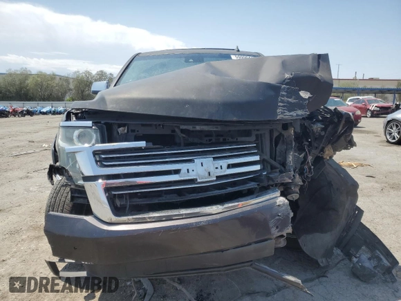 2015 Chevrolet Tahoe LTZ with VIN 1GNSKCKC2FR157035, listed as a Copart auction lot 59990415 with Not provided miles and Salvage title. Bid and sale history available at DreamBid. Image 5.