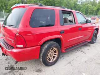 2003 Dodge Durango z VIN 1D4HR58Z83F599937, wystawiony jako IAAI lot #42483916 z przebiegiem 242 428 mil mil oraz . Historia ofert i sprzedaży dostępna na DreamBid. Obrazek 4.