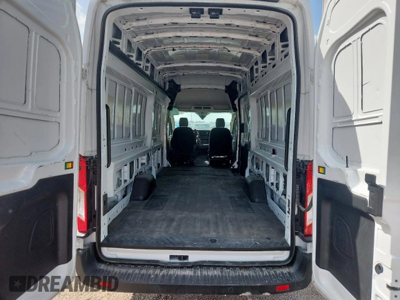 2023 Ford Transit Cargo z VIN 1FTBW3X86PKB92141, wystawiony jako Copart lot #61038085 z przebiegiem 45 032 mil mil oraz Czysty tytuł • Clean title. Historia ofert i sprzedaży dostępna na DreamBid. Obrazek 10.