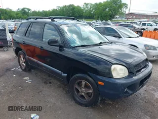 2003 Hyundai Santa Fe GLS with VIN KM8SC73D73U427756, listed as a IAAI auction lot 42142862 with 201,797 mi miles and . Bid and sale history available at DreamBid. Image 1.
