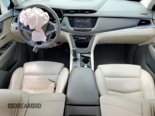 2017 Cadillac XT5 Luxury FWD с VIN 1GYKNBRS0HZ150007, выставлен на аукционе Copart как лот 54745505 с пробегом 37 271 миль миль и Списание • Salvage title. История ставок и продаж доступна на DreamBid. Изображение 8.