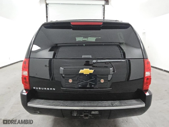 2013 Chevrolet Suburban LTZ with VIN 1GNSKKE79DR371333, listed as a Copart auction lot 74394354 with 165,171 mi miles and Clean Title. Bid and sale history available at carsss.com. Image 6.