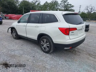 2017 Honda Pilot EX-L with VIN 5FNYF5H54HB009568, listed as a IAAI auction lot 41195225 with 112,763 mi miles. Bid and sale history available at carsss.com. Image 3.