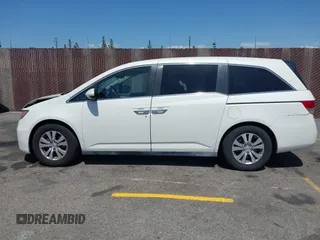 2015 Honda Odyssey EX-L with VIN 5FNRL5H67FB017554, listed as a IAAI auction lot 41974821 with 76,130 mi miles and . Bid and sale history available at carsss.com. Image 14.