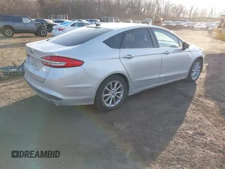 2017 Ford Fusion SE with VIN 3FA6P0H75HR125097, listed as a IAAI auction lot 41441229 with 112,160 mi miles. Bid and sale history available at carsss.com. Image 4.