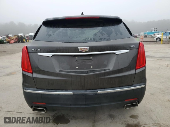 2019 Cadillac XT5 Luxury FWD with VIN 1GYKNCRSXKZ141831, listed as a Copart auction lot 43758765 with 97,402 mi miles and Salvage Title. Bid and sale history available at DreamBid. Image 6.