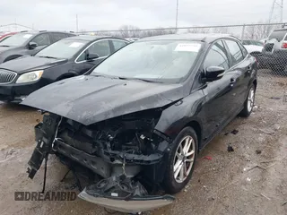 2016 Ford Focus SE z VIN 1FADP3F25GL386582, wystawiony jako IAAI lot #41097395 z przebiegiem 101 479 mil mil oraz . Historia ofert i sprzedaży dostępna na DreamBid. Obrazek 18.