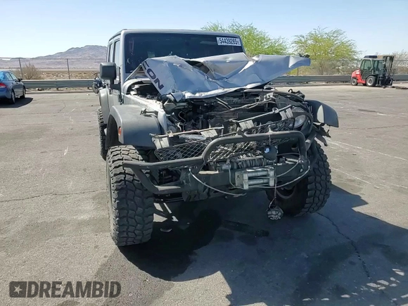 2014 Jeep Wrangler Unlimited Rubicon X with VIN 1C4BJWFG2EL308077, listed as a Copart auction lot 54439265 with 160,746 mi miles and Salvage title. Bid and sale history available at DreamBid. Image 14.