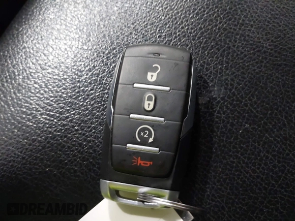 2021 Ram 1500 Big Horn z VIN 1C6SRFBT8MN696504, wystawiony jako IAAI lot #41669093 z przebiegiem 63 356 mil mil oraz . Historia ofert i sprzedaży dostępna na DreamBid. Obrazek 11.