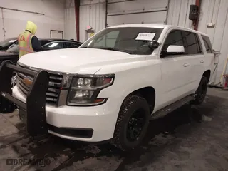 2020 Chevrolet Tahoe Commercial with VIN 1GNSKDECXLR260202, listed as a IAAI auction lot 41608712 with 137,214 mi miles. Bid and sale history available at carsss.com. Image 2.