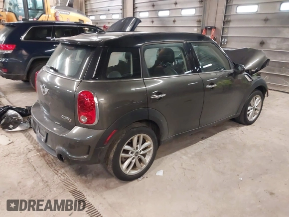2012 MINI Countryman S with VIN WMWZC3C59CWL83491, listed as a IAAI auction lot 41791573 with 115,355 mi miles and . Bid and sale history available at DreamBid. Image 4.