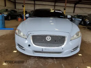 2013 Jaguar XJ with VIN SAJWJ1CD1D8V51462, listed as a Copart auction lot 50527985 with 62,995 mi miles and Salvage title. Bid and sale history available at DreamBid. Image 5.