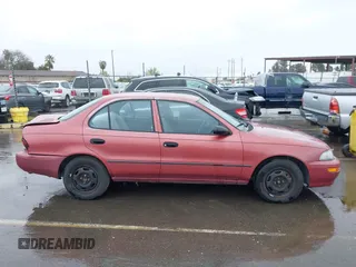 1997 Geo Prizm LSi with VIN 1Y1SK5265VZ457659, listed as a IAAI auction lot 41778510 with 149,073 mi miles. Bid and sale history available at carsss.com. Image 13.
