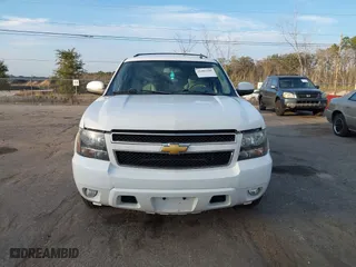 2012 Chevrolet Suburban LT with VIN 1GNSCJE06CR226677, listed as a IAAI auction lot 41403380 with 199,213 mi miles. Bid and sale history available at carsss.com. Image 12.