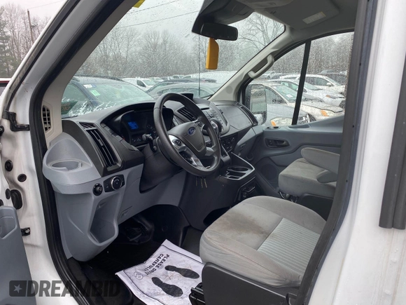 2018 Ford Transit z VIN 1FTYR1YG6JKA87506, wystawiony jako IAAI lot #42501070 z przebiegiem 167 892 mil mil oraz . Historia ofert i sprzedaży dostępna na DreamBid. Obrazek 18.
