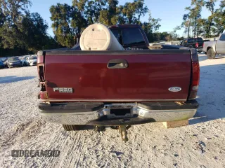 2000 Ford F-250 XL with VIN 1FTNX21L6YEE29549, listed as a Copart auction lot 74982324 with 133,883 mi miles and Salvage title. Bid and sale history available at DreamBid. Image 6.