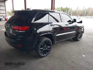 2019 Jeep Grand Cherokee Laredo E with VIN 1C4RJFAG0KC565739, listed as a IAAI auction lot 42039038 with 103,358 mi miles and . Bid and sale history available at DreamBid. Image 4.
