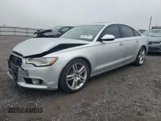 2015 Audi A6 2.0T Premium with VIN WAUFFAFC0FN009984, listed as a Copart auction lot 84247834 with 85,290 mi miles and Salvage Title. Bid and sale history available at carsss.com. Image 1.