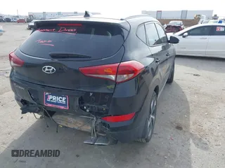 2018 Hyundai Tucson Sport with VIN KM8J33AL7JU772152, listed as a IAAI auction lot 41285203 with 87,188 mi miles. Bid and sale history available at carsss.com. Image 4.
