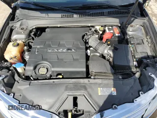 2015 Lincoln MKZ z VIN 3LN6L2JKXFR600669, wystawiony jako Copart lot #51130115 z przebiegiem 75 176 mil mil oraz Szkoda całkowita • Salvage title. Historia ofert i sprzedaży dostępna na DreamBid. Obrazek 11.