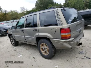 1997 Jeep Grand Cherokee Limited with VIN 1J4GZ78Y0VC599554, listed as a Copart auction lot 72006854 with 321,283 mi miles and Salvage Title. Bid and sale history available at carsss.com. Image 2.