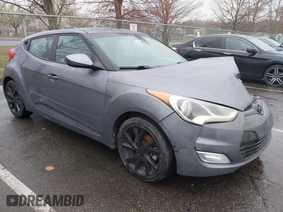 2017 Hyundai Veloster with VIN KMHTC6AD4HU309625, listed as a IAAI auction lot 41933497 with 184,632 mi miles. Bid and sale history available at carsss.com. Image 1.