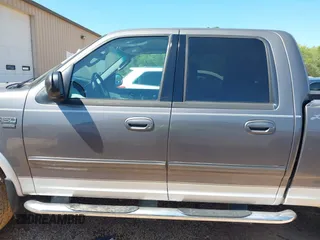 2003 Ford F-150 XLT with VIN 1FTRW08L83KC00394, listed as a IAAI auction lot 41998367 with 235,868 mi miles. Bid and sale history available at carsss.com. Image 14.