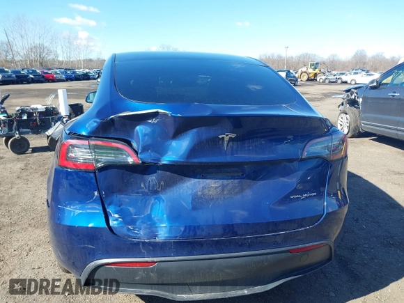 2021 Tesla Model Y Long Range with VIN 5YJYGDEE8MF293230, listed as a IAAI auction lot 41744033 with 56,797 mi miles and . Bid and sale history available at DreamBid. Image 6.