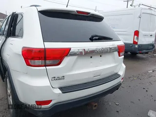 2013 Jeep Grand Cherokee Laredo with VIN 1C4RJFAG6DC557163, listed as a IAAI auction lot 42019052 with 125,058 mi miles. Bid and sale history available at carsss.com. Image 15.